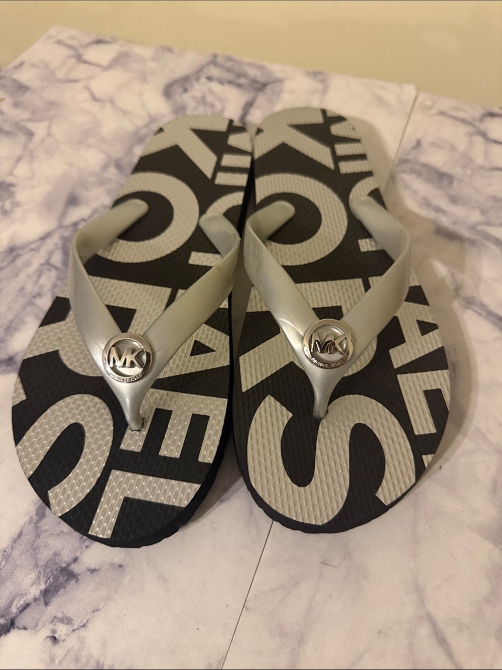 Michael Kors Black and Silver Logo Flip Flops